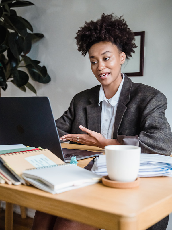 Poster for the film Love Under the Olive Tree, a white man and woman hold containers of olive oil and smile at the camera
